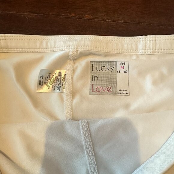 Lucky in Love Tennis Skirt - Size Medium - Stylish & Performance Ready! - Picture 3 of 3